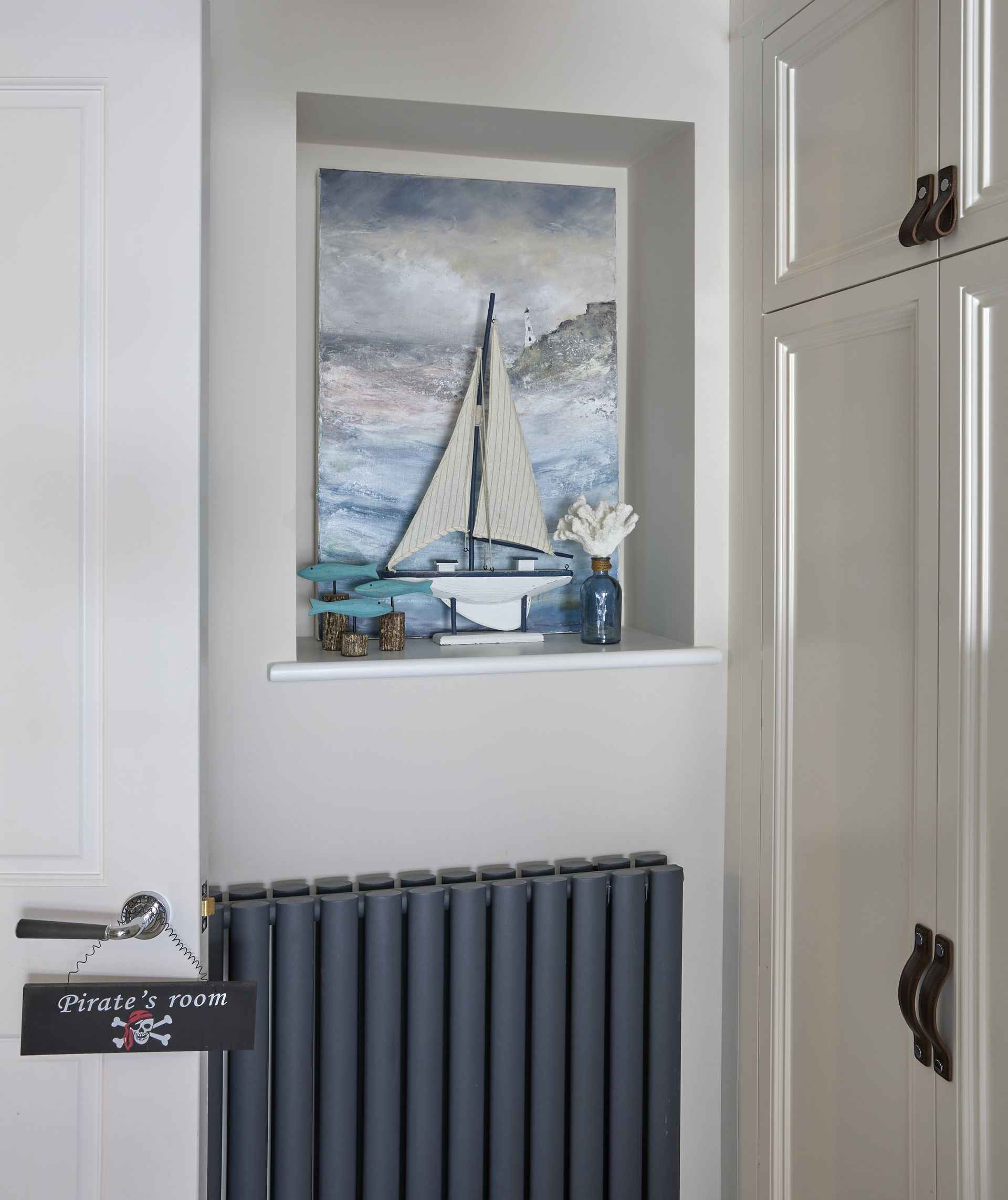 Sea and boat picture on the wall of the pirate room of mountain ash house